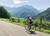 Cycling in the mountains in the south of France, with a view of dramatic mountains in the distance