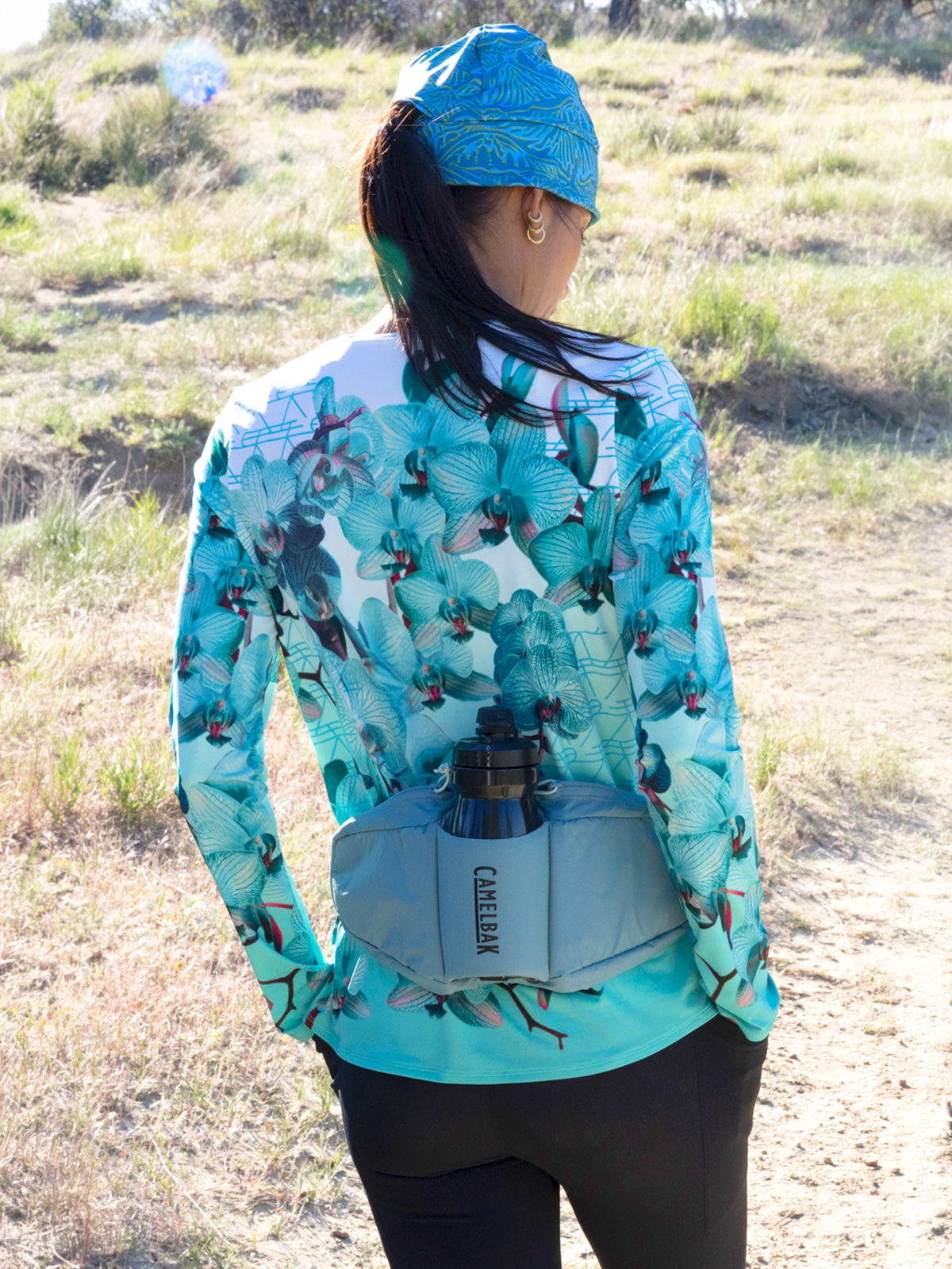 Terry Soleil Free Flow Long Sleeve Multi Sport Top in color || Celeste